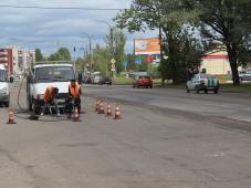 11 июля 2019 г. Великий Новгород, Нехинская ул. Ремонт дороги в рамках национального проекта &quot;Безопасные и качественные автомобильный дороги&quot;. Фото Ольги Полуяновой